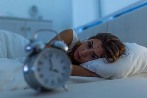 femme qui ne dort pas